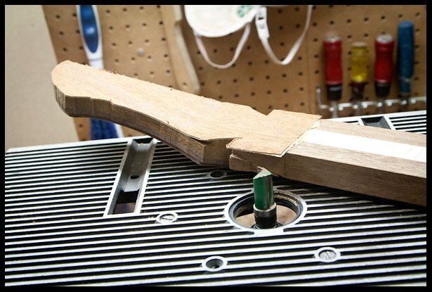 Routing the headstock according to the template