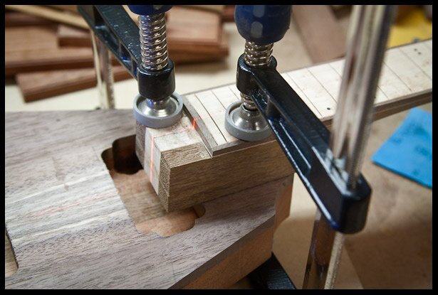Aligning the neck to the body using a laser