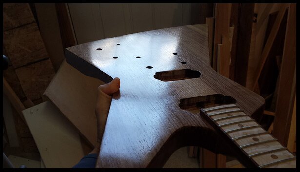 Applied 10 coats of tru-oil to the walnut top