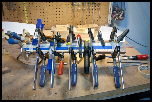 gluing the maple fretboard to the neck
