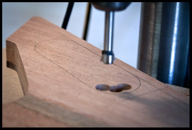 Drilling away most of the wood for the electronics compartment
