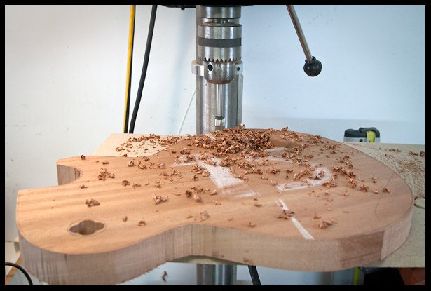 Drilling most of the wood from the electronics cavity
