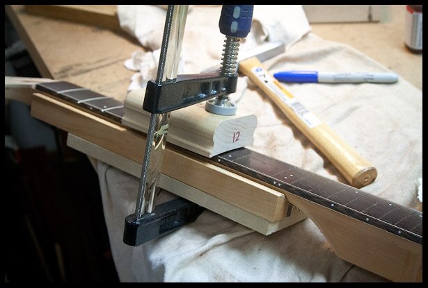Clamping the frets 