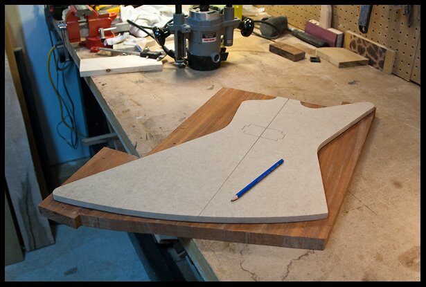 Tracing the body shape on the mahogany body