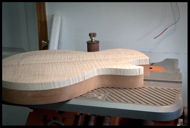 Cleaning the router bit scratched on the spindle sander