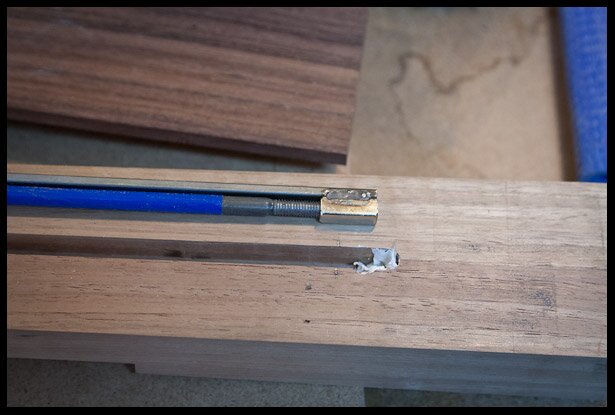 Some silicon caulking at the ends to remove any potential rattling