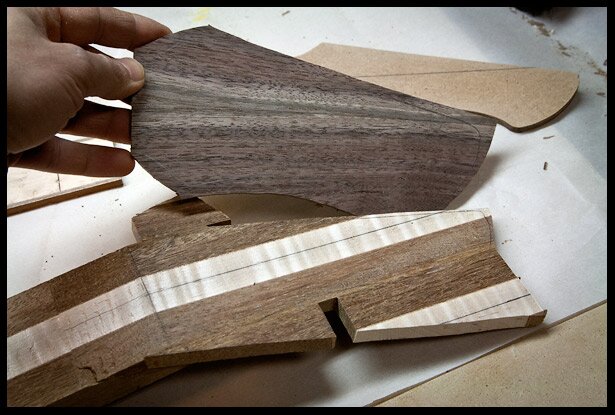 The bookmatched headstock veneer 