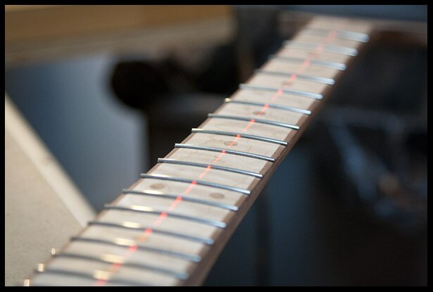 Using a laser to align the neck with the body