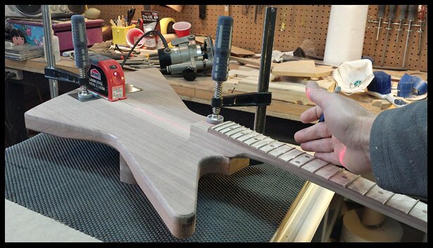 Aligning the neck with the body centerline with a laser