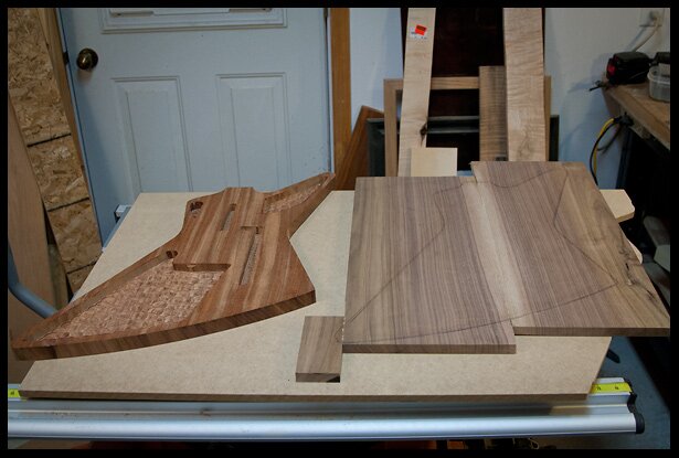 The top walnut blank next to the mahogany back