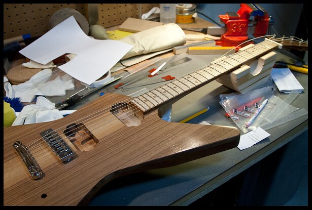 Strings installed to fine tune nut slots