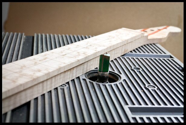 Flush trim the fretboard