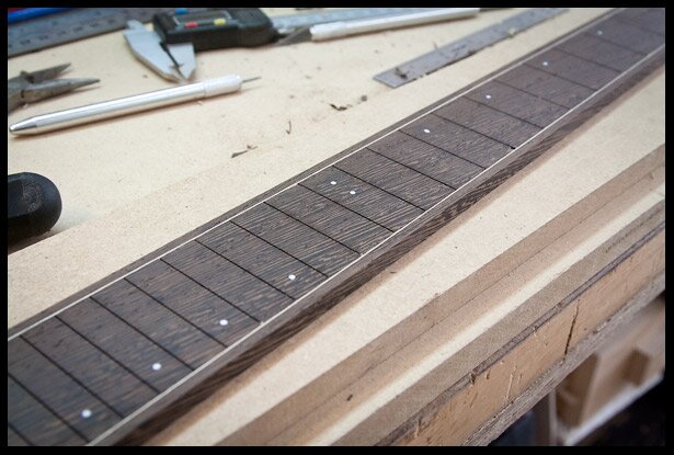 Fret markers are added