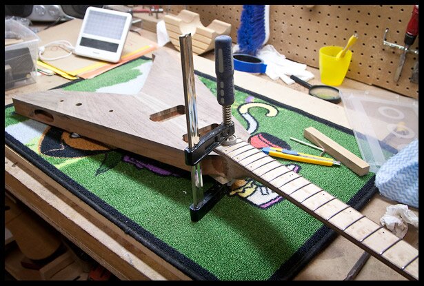 Clamping the neck while the glue dries