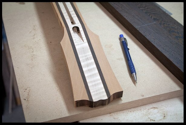 The headstock is shaped
