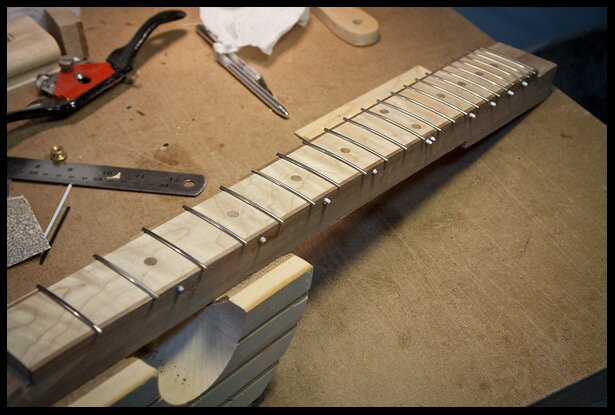 Fret installation completed